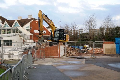http://i1152.photobucket.com/albums/p490/cricketphotos1/Cricket%20Photos/Ground%20redevelopment%20all%20years/Redeveloping%20NE%20corner%20Plumbers%20yard%20and%20Scoreboard%20Stand%202.jpg